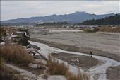 A lahar-filled river,  almost 21 years after Mt Pinatubo’s devastating eruption in 1991.  Small volcanic stones continually flow with the river waters and serve as source of living for nearby residents.: by bingtajon, Views[1351]