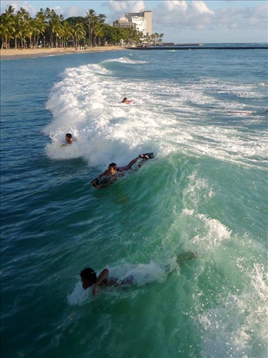 Returning to shore on the turquoise tide. Waikiki, Hawaii.