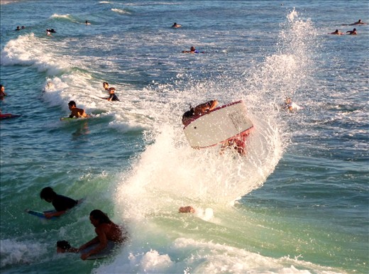 Surf acrobatics. Waikiki, Hawaii.