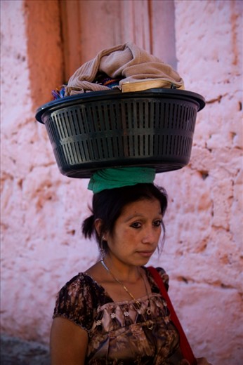 Once packaged, Veronica travels one hour to the neighbouring village of San Marcos La Laguna to sell her bread. Here she sells daily to the tourists in a bid to earn enough to make it from one day to the next.