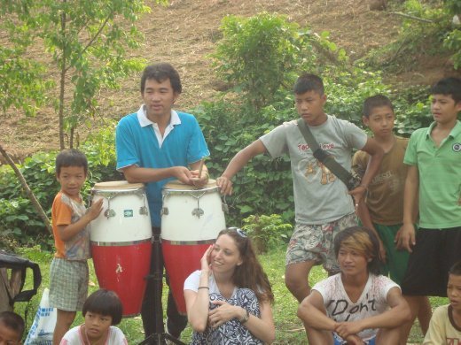 The guy playing the drums is P'Nu.  He is the one we are trying to help send to school.