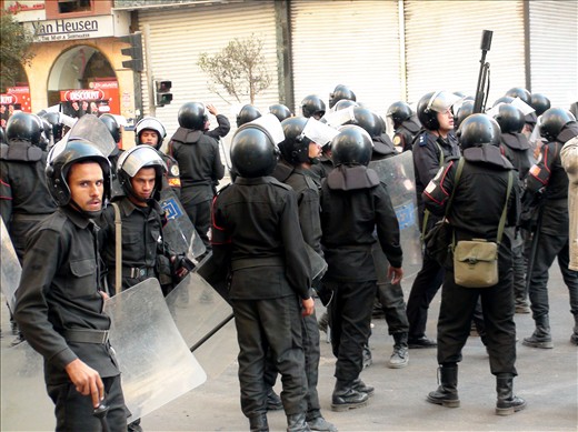 Riot police on the streets of downtown Cairo on the second morning of the protests, waiting in anticipation of more unrest. (Attempt to confiscate my camera seconds after this shot.)