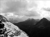 Closer to the clouds - Stopping to admire the view on the path leading from the top of Sass Pordoi (2950m) to the next summit, Piz Boè (3152m).: by blindreflections, Views[570]