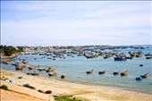 The peaceful coast dotted with a variety of boats for the daily activities the sleepy beach town, Mui Ne.  : by blythecollins, Views[307]