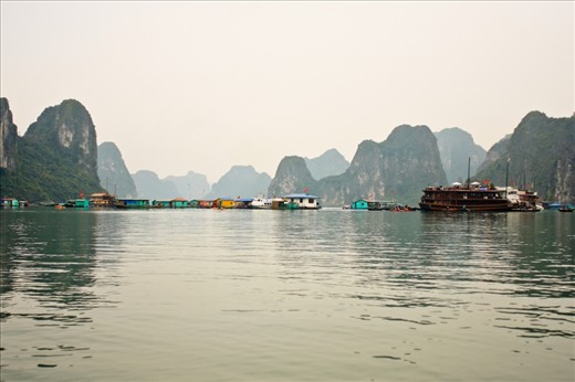 Against the ominous rocks of Halong Bay, this village floats peacefully. 