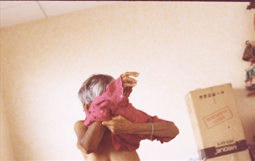 The home is all about routine. Scheduled excercise, meals and curfews. This June the home threw an elaborate party for their 25th anniversary. A lot of preparation and excitement preceded the day. Here, Rosita exchanges the simple cotton dress they wear daily for a pink sequined gown. 