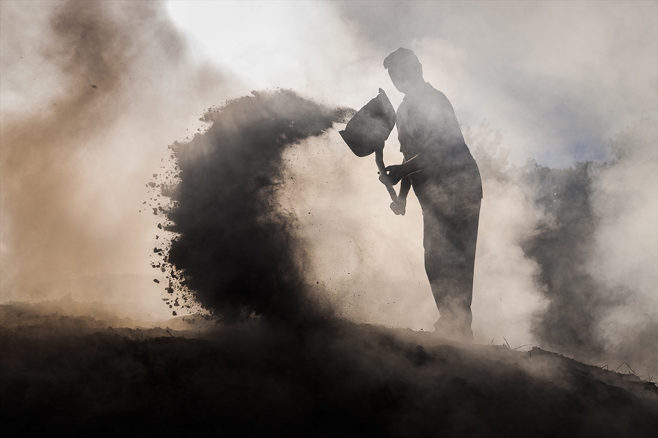 Coal makers, Akos-Bacsi doing his lifetime job, taking care of its coal pile. He raises about 20 such piles in one year. I visited also the dependencies of his coal piles and discovered that he’s a very humble men but also sensible, having a hut surrounded by a garden with vegetables and beautiful flowers.