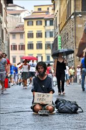 Silently asking for a little bit of help

Poverty is everywhere, such is the case in Florence too. Logic implies, more people in big city higher the chance of geting any money for doing nothing. A poor man just asking to survive a rainy day while most of the people pass him by carelessly.: by bogisp, Views[183]