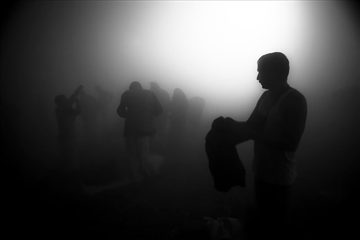 Pilgrims get ready for bathe after sunrise.