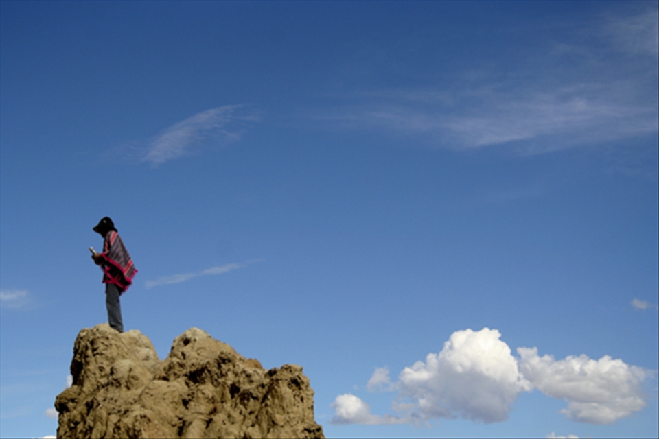 Valerio playing music at Valle de la Luna - La Paz