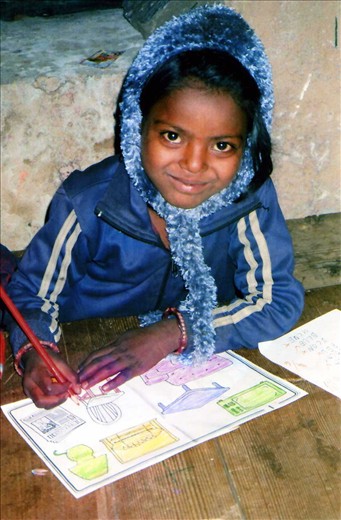 Dipia (Class 2) is enjoying colouring in.... library Winter classes 2013/14