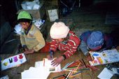 A class in the library (Khati) using coloured pencils on the colouring sheets recently printed on the new printer.: by bonnie, Views[473]