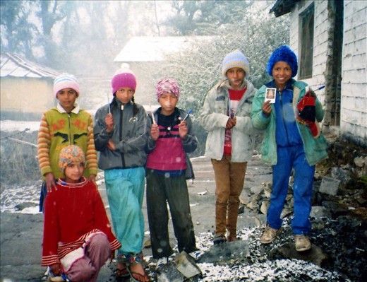 Some Class 6 kids with their new beanies (pens & pencils) in the first snow. January 2014.