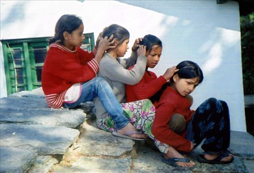 Another angle on that head lice check! This was a random shot taken while the girls were waiting for a computer class