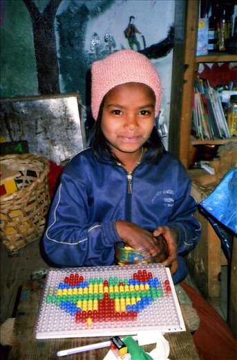 Leela (Class 5) using the peg board during Winter school 2013/14.