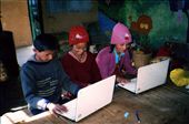 The library pupils couldn't believe that two computers were going to arrive! The excitement was palpable... to be able to touch, feel and use a laptop was the best thing out! Here is a shot of a trio of Class six children on one of their first computer lessons.: by bonnie, Views[353]