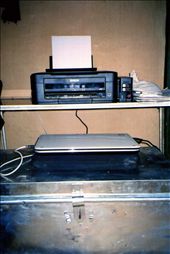 New printer setup in  peAk  building. The printer table (made by Scott) utilised a 'maufacturing defect' solar plate that had been kicking around for years. The tin trunk the new laptop sits on was also used to cart goods via mule into the valley.: by bonnie, Views[434]