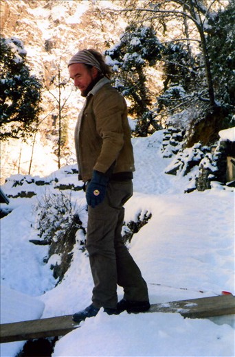 Scott is about to 'walk the plank' onto the peAk building roof to clean the solar panel array of fresh snow. January 2014.