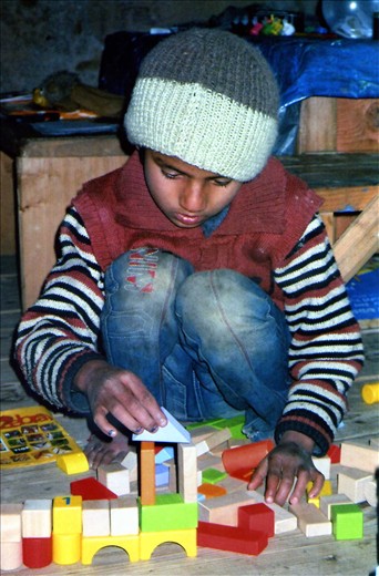 Surech (Class 2) the 'engineer' focusing on his latest construction.