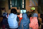 The library  has two new laptops used for computer training and watching educational DVDs....here is a shot of the kids enthralled with a DVD.: by bonnie, Views[1375]