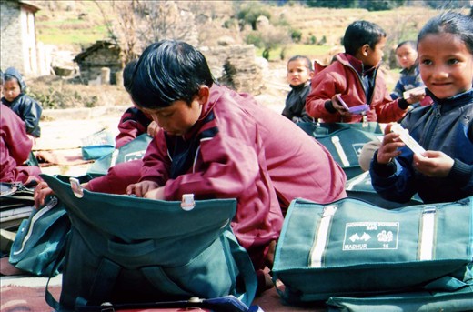 Jatoli school educational supplies project 2014. Munju & Pooja checking out the goodies.