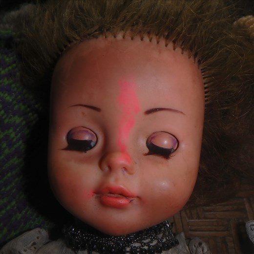 The kids put their own special touches to this much loved doll. Note the sindoor - this is when we discovered that lipstip stains plastic!