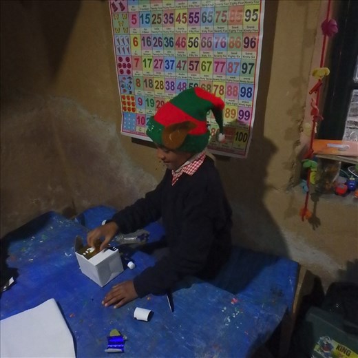 Deepak in his favourite hat! We got given three hats - a santa, glitter and a woollen mouse hats - the kids fight  each class on 'who gets what hat', clearly we need to get more hats!