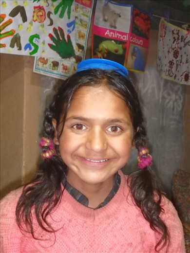 A big smile from Manisha who is 'gifted' with an incredible memory. We have two special needs children in the school both of whom have flourished in a positive learning atmosphere without the threat (or actual) violence that occurs at the local government school.