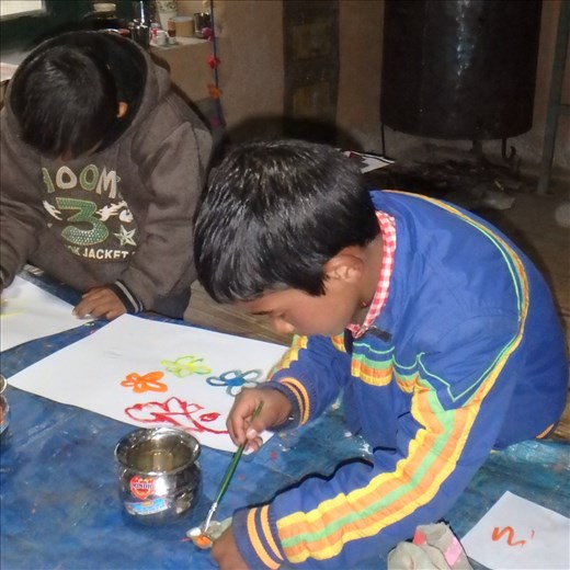 There are 3 Pankaj's at school. This is Pankaj (Class 2) & Lucky brushing up a masterpiece.