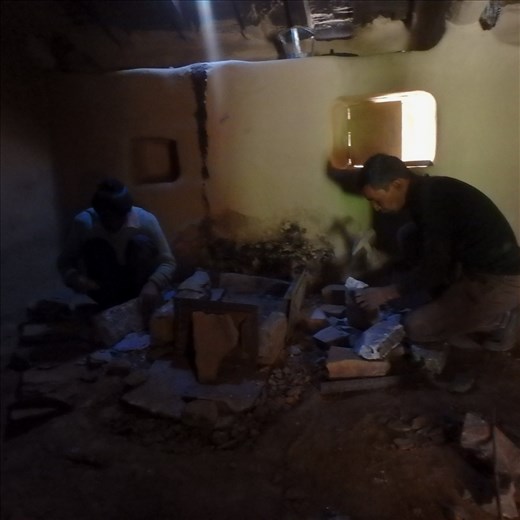 Hookum & Digember at work on the first stove (chulha)