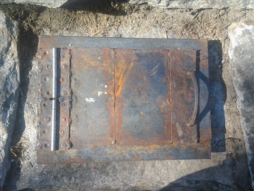 A sample of a stove door (two were used in each unit). Fabricated in Bageshwar using 8mm steel.