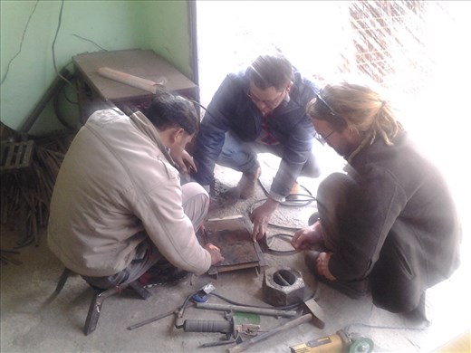 Sharaz, Sharad & Scott discussing the project at the workshop