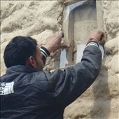 Dinesh getting the size right. The application of thick UV stable plastic made a world of difference to light levels inside households.: by bonnie, Views[247]