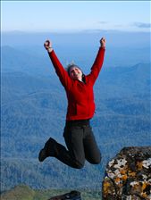Australian student Katie leaps with joy at the 1300m summit of Mt Weld!: by bookend, Views[415]