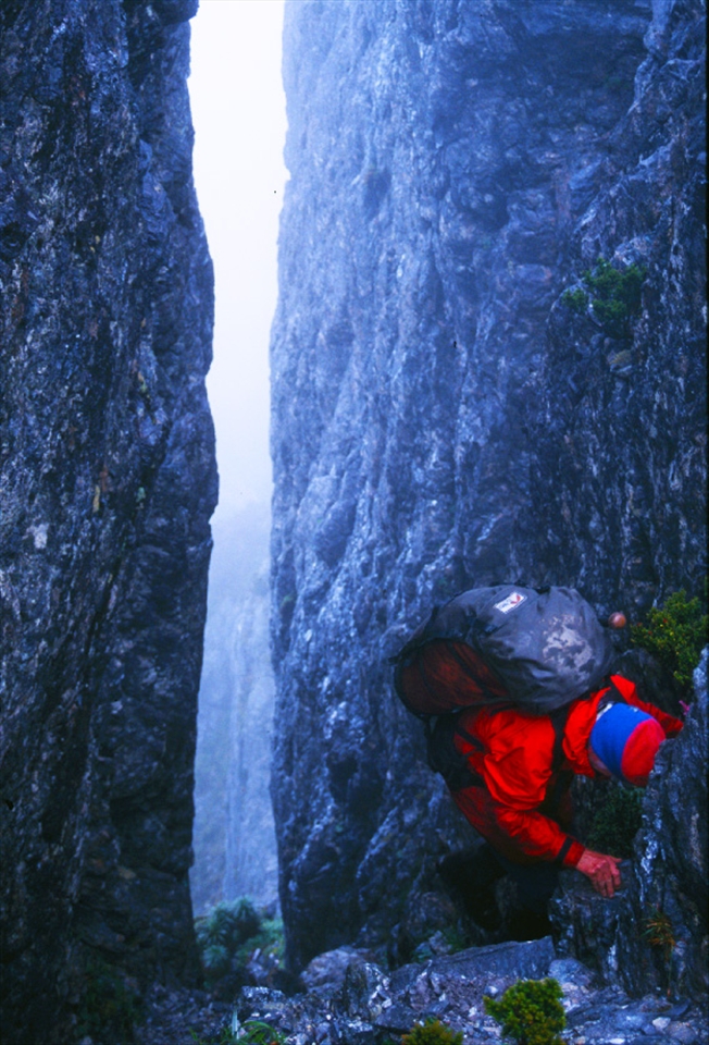 Hauling heavy packs through difficult and imposing terrain.