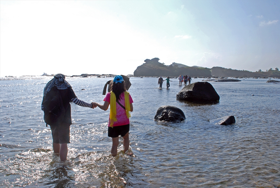 A journey to the enchanting rock formation in North Samar Philippines begins with a single wade
