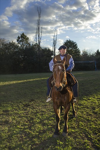 By the end of the day, the boys father looks proud of his and his family labor.