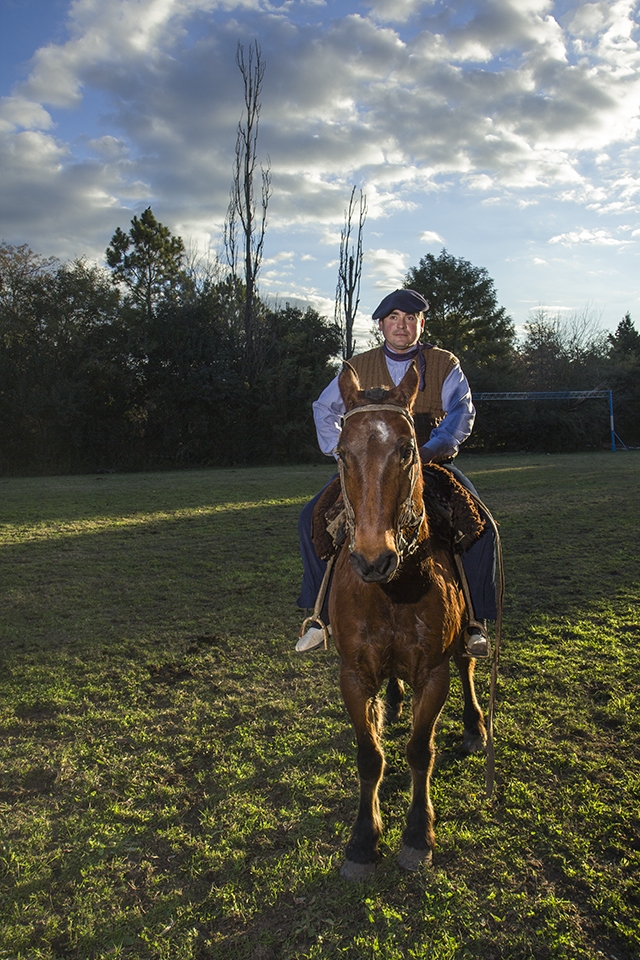 By the end of the day, the boys father looks proud of his and his family labor.