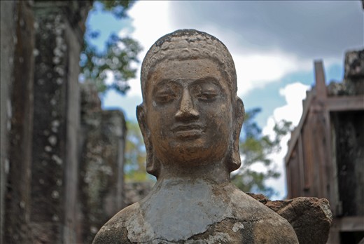 A weathered Buddha statue at Angkor Thom, near Siem Reap in Cambodia. Photo by: Matt Bossons, May 2012.