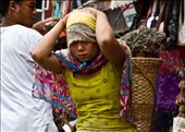 One of the surprising scenes one might encounter in Nepal is the women labor for building constructions. In Nepal women work even harder than men when it comes to construction, however they are paid less. They carry heavy loads of construction materials while bearing most of the weight on their forehead. The young girl in the picture was working in a construction site around the Bouddhanath.: by bouddhanath, Views[849]