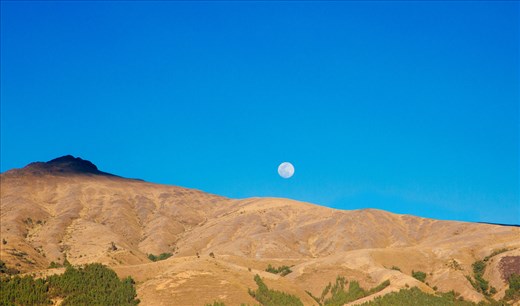 The beautiful moonset over the mountains that surround Huancayo, Peru.