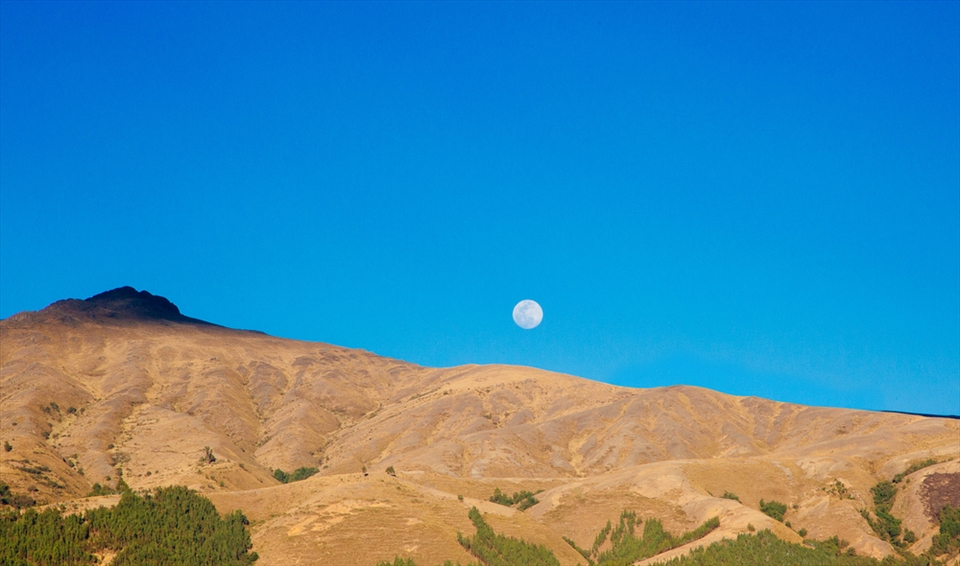 The beautiful moonset over the mountains that surround Huancayo, Peru.