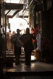 Yes a guitar playing priest leading a procession through ancient corridors along the Via Dolorosa while leading the group in song, within the Old City of Jerusalem, held to be the path that Jesus walked, carrying his cross, on the way to his crucifixion.: by brian_arnold4, Views[294]