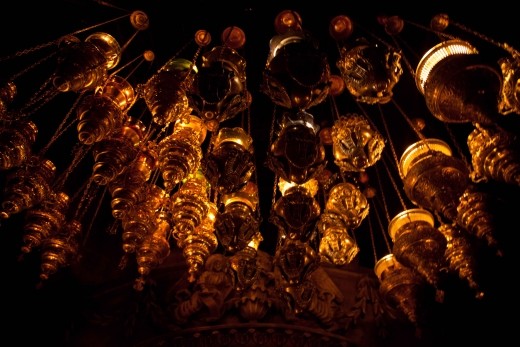 The Aedicule, imagine entering a hot and cramped room maybe as wide as your outstretched arms, you crouch down to walk hunched through a short hallway and suddenly you look up and see the altar and hanging lamps of the Tomb of Jesus. Even if you are not religious you can feel almost like a weight on your body the physical presence the place exudes. 