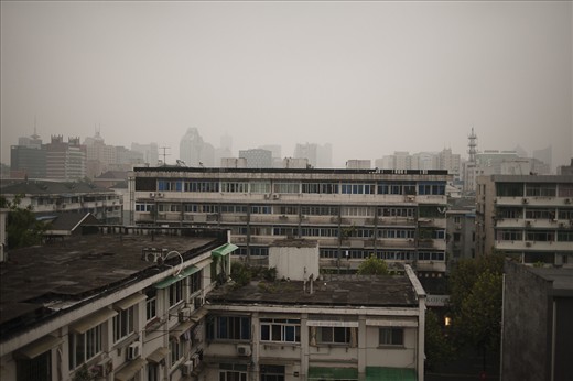 Pollution takes its toll on the sky, and buildings' finishes, via acid rain.