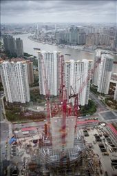 The frenzy of construction in Shanghai, China, an ever-expanding metropolis full of color, energy and over 23 million people.: by briangooding, Views[700]