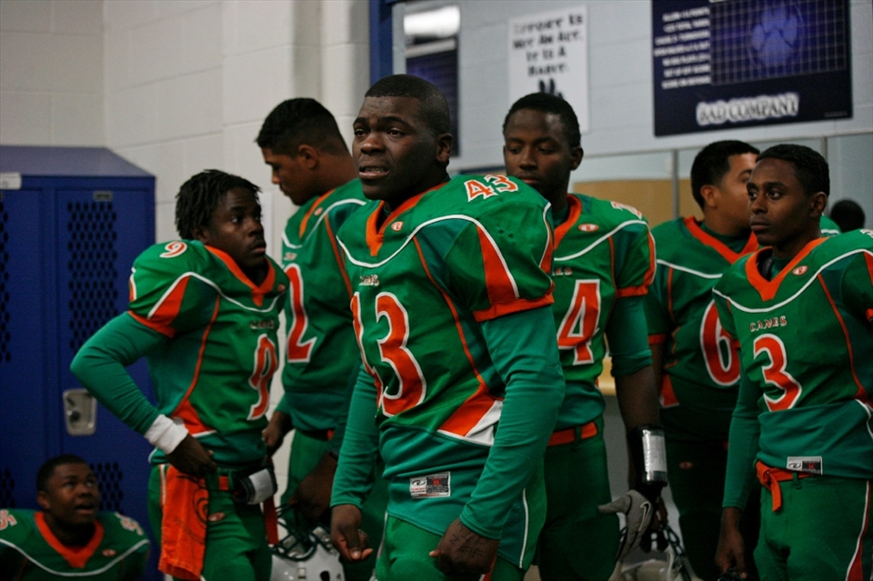 Daveon 'Scarface' Mathis, senior, cries out to his teammates, who were down at the half of their first round playoff game, to pull it together. He says repeatedly, 