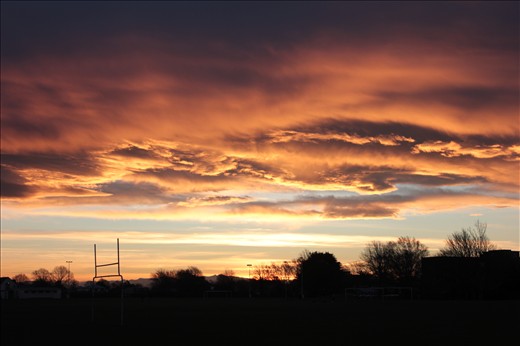 Sunset over the Ilam rugby fields in Chch.
I end the series as I began, with a sunset. Chch is known for it's striking sunsets and these are possible because of the extreme flatness of the Canterbury planes. Ironically this flatness which makes Chch beautiful and special is a big part of the cause of it's earthquake problems. Chch was built over swampland and two big fault lines. And luck had it that those fault lines were to shake. But Christchurch would not be the same without the flat planes which allow the farming industry to prosper and brin the strange and beautiful weather patterns that Chch gets to see. 
The flatness of the city is a weakness and a gift at once. And with this, the message is that one's flaws and weaknesses are often what makes one special, unique, and stronger as a result.