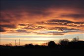 Sunset over the Ilam rugby fields in Chch.
I end the series as I began, with a sunset. Chch is known for it's striking sunsets and these are possible because of the extreme flatness of the Canterbury planes. Ironically this flatness which makes Chch beautiful and special is a big part of the cause of it's earthquake problems. Chch was built over swampland and two big fault lines. And luck had it that those fault lines were to shake. But Christchurch would not be the same without the flat planes which allow the farming industry to prosper and brin the strange and beautiful weather patterns that Chch gets to see. 
The flatness of the city is a weakness and a gift at once. And with this, the message is that one's flaws and weaknesses are often what makes one special, unique, and stronger as a result.: by brielle, Views[511]