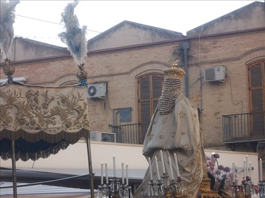 The black Virgin Mary's statue step by step across the city
